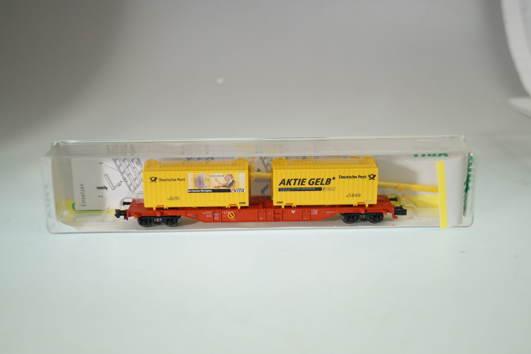 Spur N: Minitrix 15211 Containertragwgen Aktie Gelb, neu – gearontologist