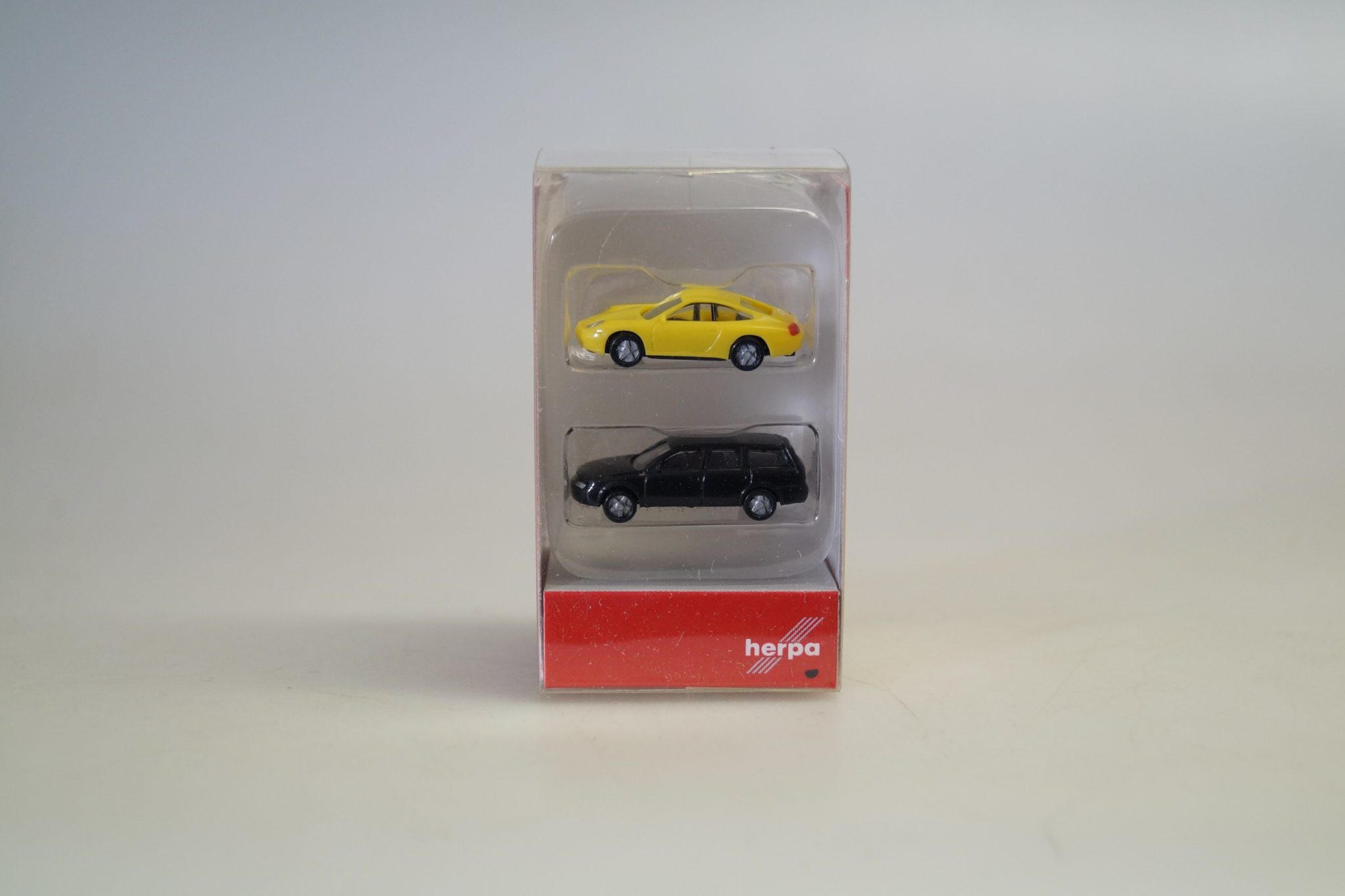 Spur N: Herpa 065122 2x Pkw Porsche + Golf Variant gelb + schwarz, neuw./ovp