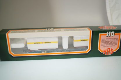 HAG h0 AC!: No.392 Flachwagen Sgss + 2x Container Bertschi, neu