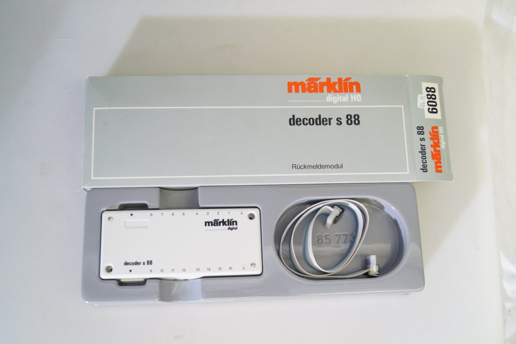 h0 Märklin 6088 Decoder/Rückmeldemodul – neu/OVP – gearontologist