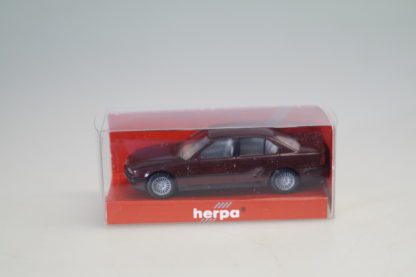 1:87 Herpa 032629 BMW 7er facelift dkl.rot-met., neuw./ovp