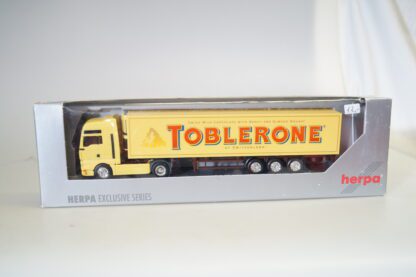 1:87  Herpa Exclusiv MAN TGA Sz Toblerone, neuw./ovp