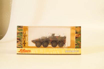 1:87 Schuco Military:  26239 Transportpanzer Boxer Flecktarn, neu