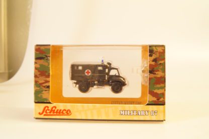 1:87 Schuco Military:  26251 Unimog San, neu