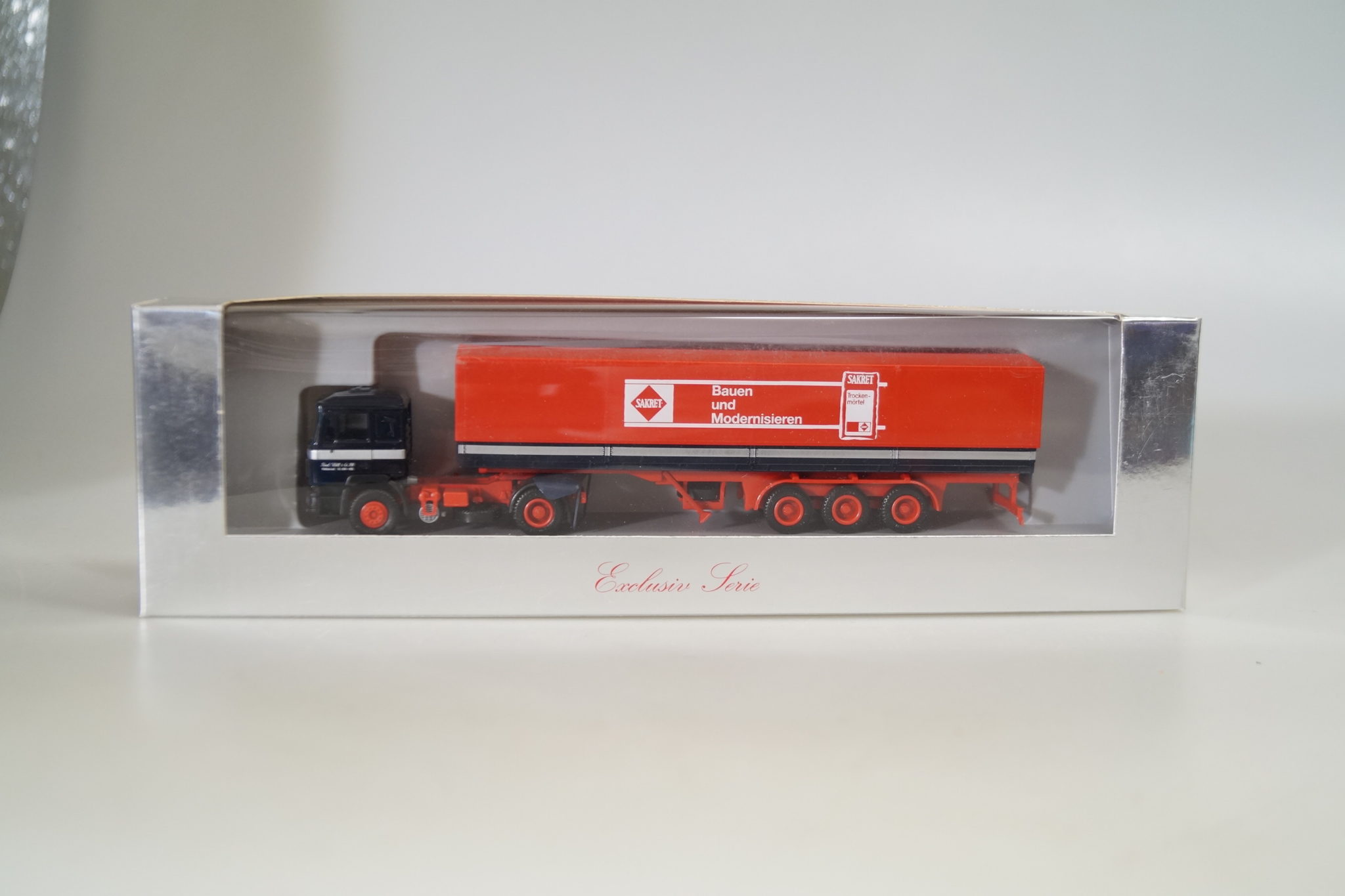 1:87 Herpa exclusiv MAN Sakret, Bauen Modernisieren, neu