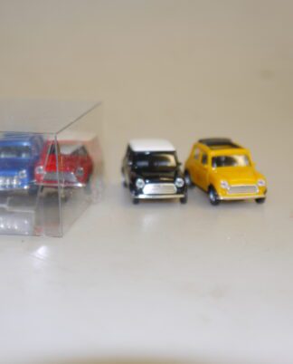 1:87 Herpa 021104 4 Stück(!) Mini Cooper: schwarz/rot/gelb/blau (SD offen), neuw./Teil-Vp