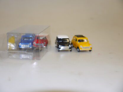 1:87 Herpa 021104 4 Stück(!) Mini Cooper: schwarz/rot/gelb/blau (SD offen), neuw./Teil-Vp