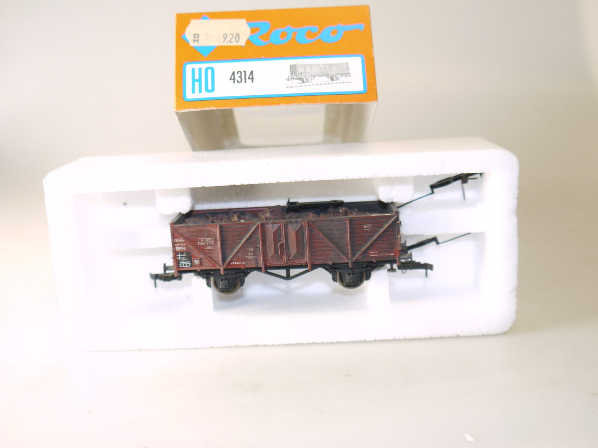 h0 Roco 4314 Hochbordwagen Omm21 mit Ladung: Altmetall, top/ovp/KKK/gealtert