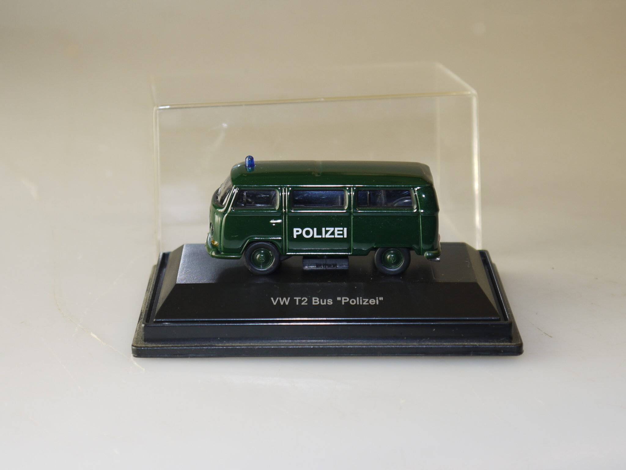 1:87 Schuco: 25431 VW T2 Bus Polizei, neuw./Teil-Vp